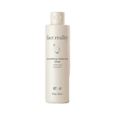 Bottle of 'face reality' soothing radiance toner on a white background