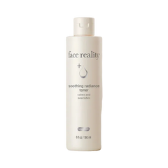 Bottle of 'face reality' soothing radiance toner on a white background