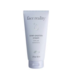 A tube of Face Reality Cran-Peptide Cream, designed for nourishing and moisturizing the skin.